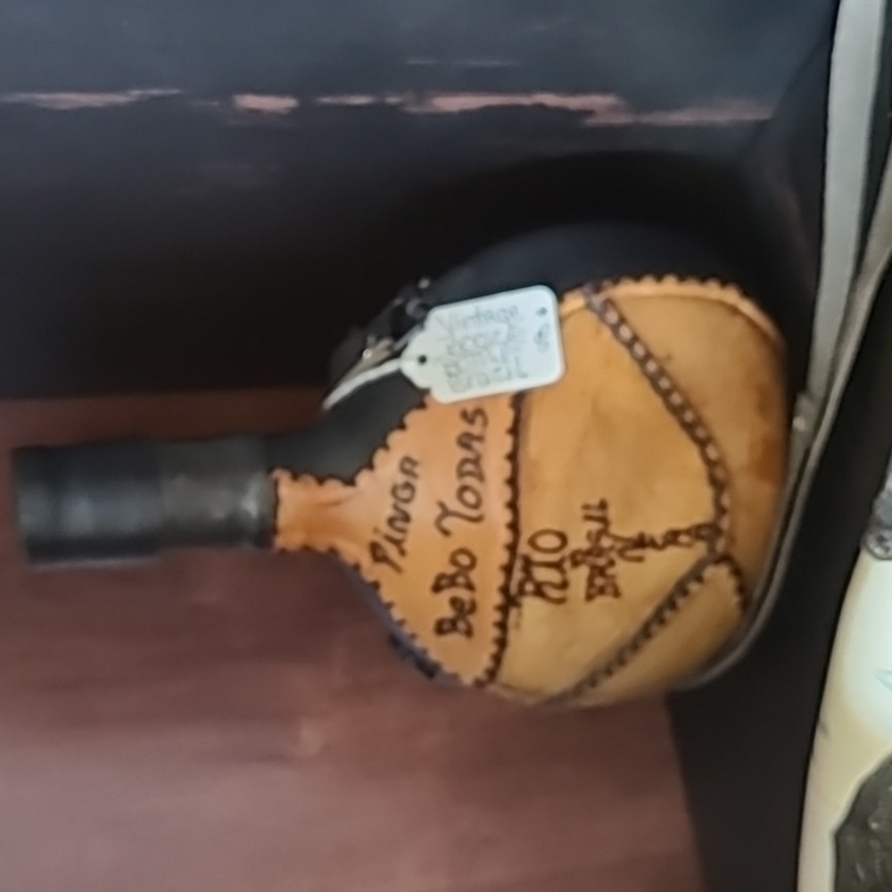 COLLECTABLE LEATHER WRAP BOTTLE
